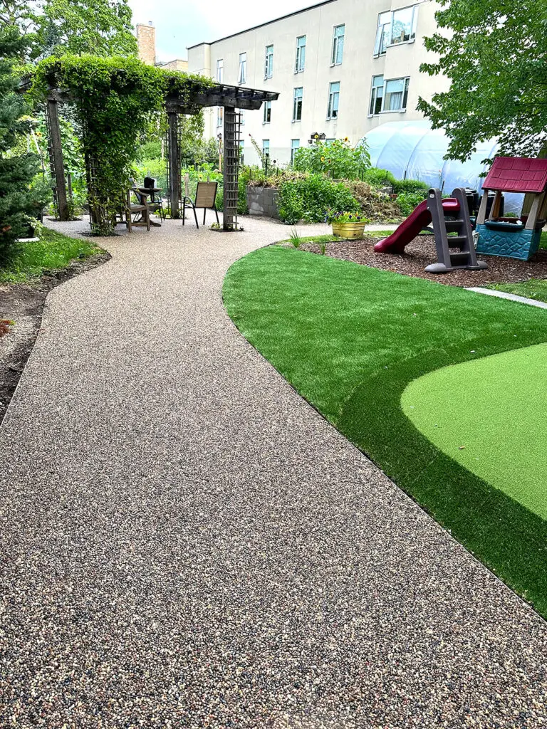 permeable walkways for wheelchairs and walkers using resin bound aggregate