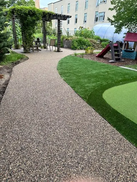 permeable walkways for wheelchairs and walkers using resin bound aggregate